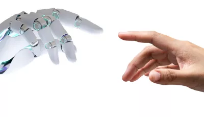 mano robotica tocca mano umana