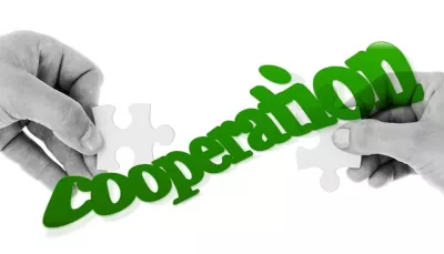 scritta cooperazione